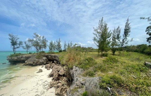 Oceanfront plot with cave for sale